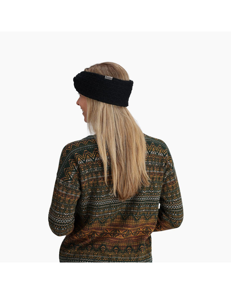 Back view of a woman wearing the Royal Robbins Baylands Reversible Headband in Jet Black.