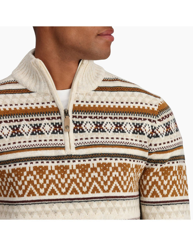 Close-up front view of a man wearing the Royal Robbins Men's Ponderosa 1/4 Zip sweater in Ivory.