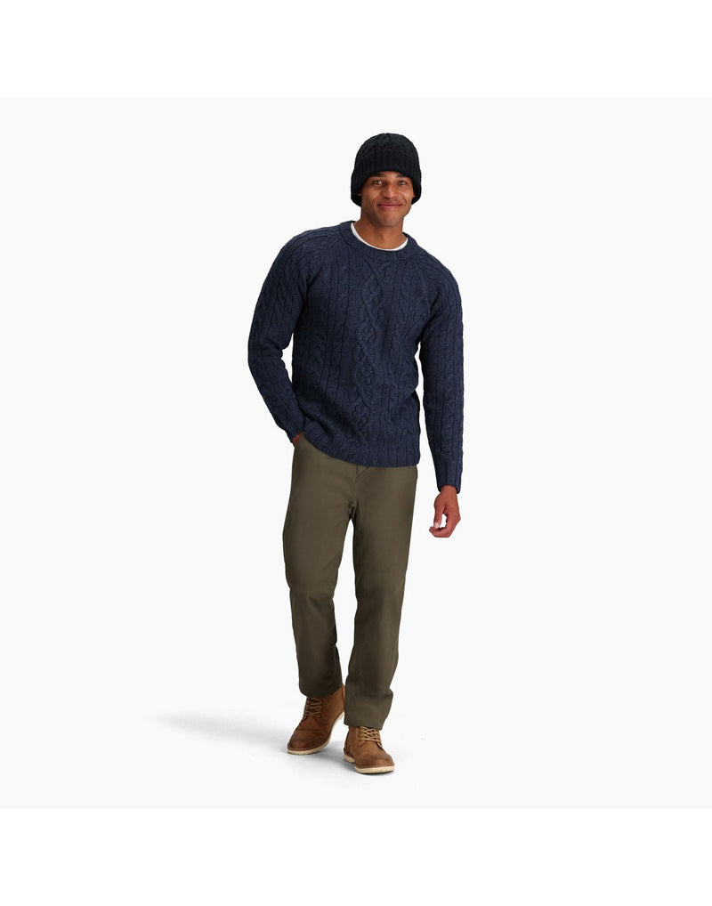 Front view of a man wearing the Royal Robbins Unisex Baylands Lined Beanie in Jet Black.