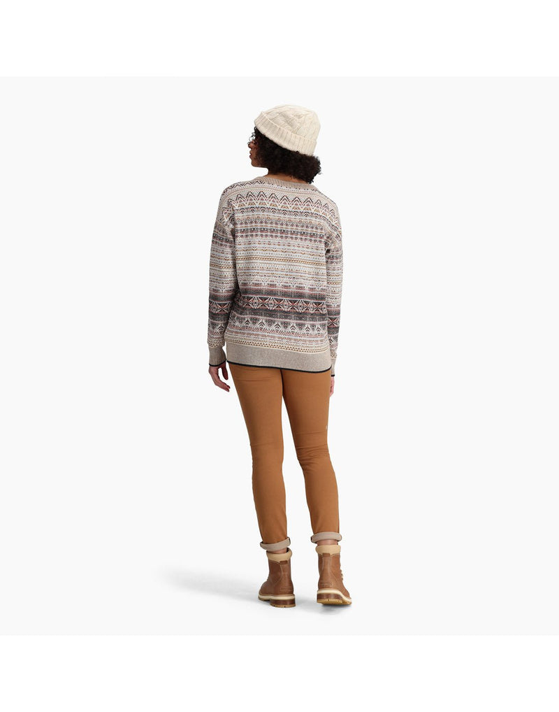 Back view of a woman wearing the Royal Robbins Unisex Baylands Lined Beanie in Ivory Heather.