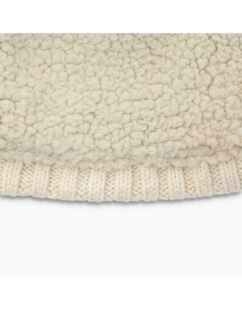 Close up, interior fleece lining of the Royal Robbins Unisex Baylands Lined Beanie in Ivory Heather.
