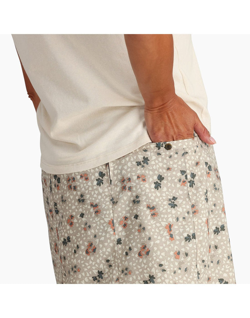 Back view of skort with one hand in back pocket