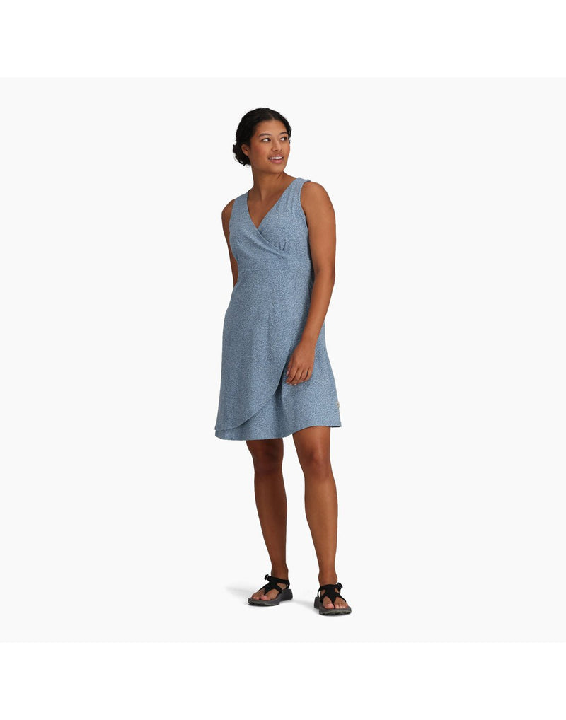 Woman wearing Royal Robbins Women's Featherweight Knit Dress in sea niserne print, blue colour with black sandals, front view