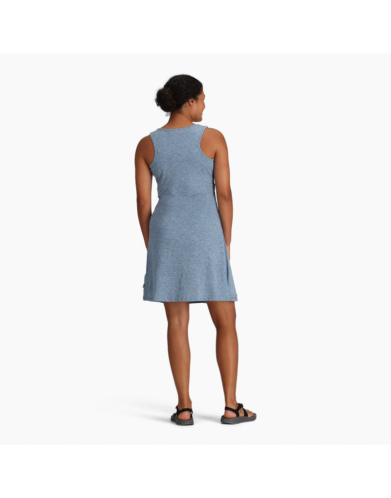 Woman wearing Royal Robbins Women's Featherweight Knit Dress in sea niserne print, blue colour with black sandals, back view