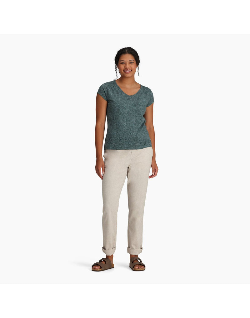 Woman wearing Royal Robbins Women's Featherweight Slub Tee in sea pine with khaki pants and sandals, front view
