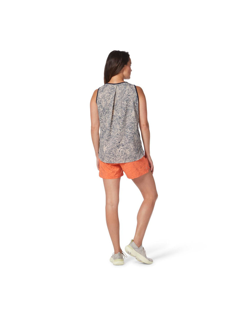 Back view image of a woman wearing Royal Robbins Women's Spotless Evolution Tank showing the Powder Elkhorn Print back panel.