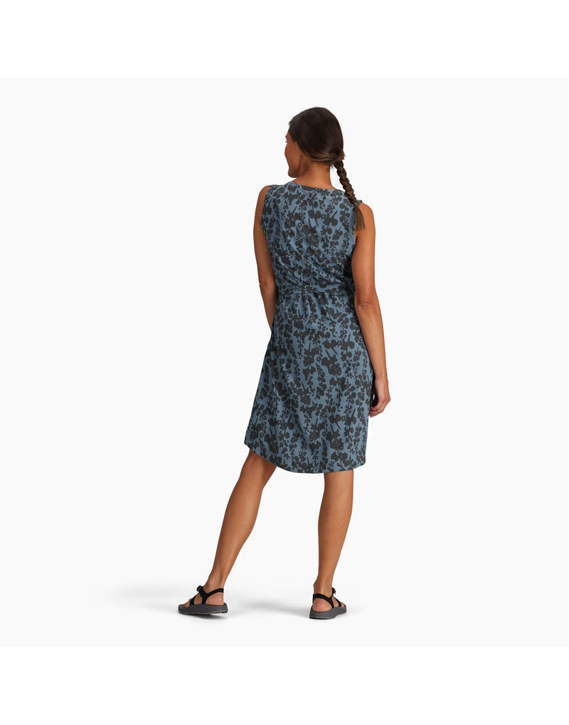 Woman wearing Royal Robbins Women's Spotless Traveller Tank Dress in sea alamere print, grey on blue floral, back view