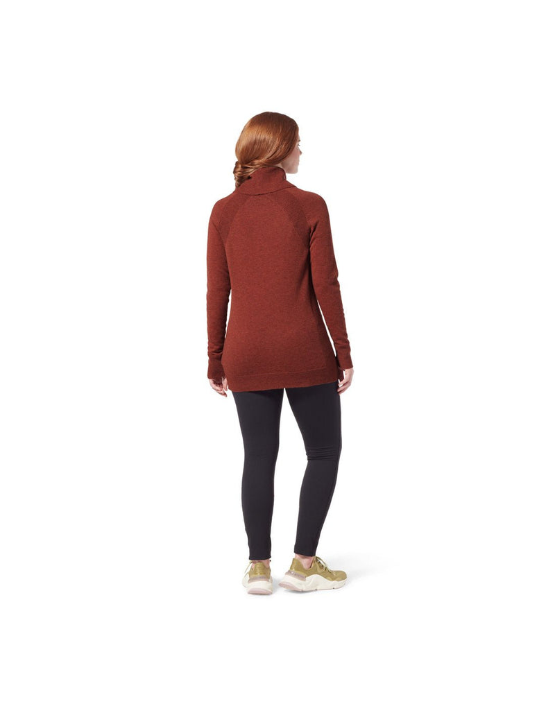 Back view of a woman wearing the Royal Robbins Women's Westlands Funnel Neck in Rustic Heather.