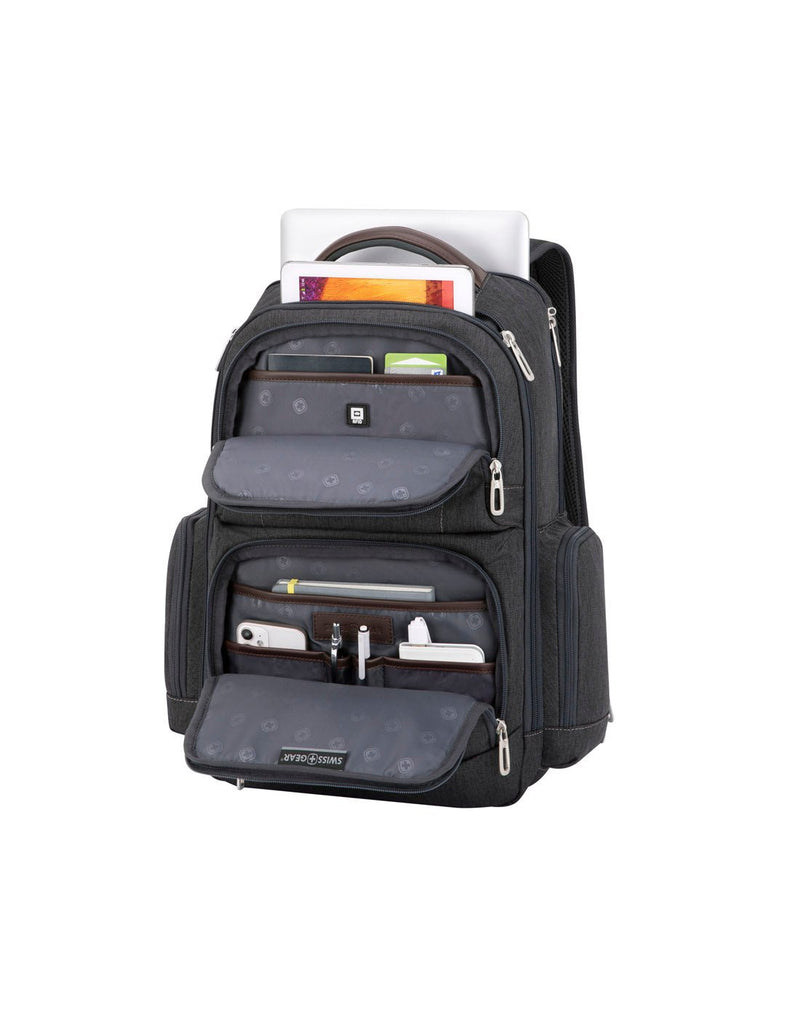 Swiss Gear 26L Computer Backpack, grey, front angled view with all pockets unzipped and filled with laptop, tablet, notebook, phone, pens, etc