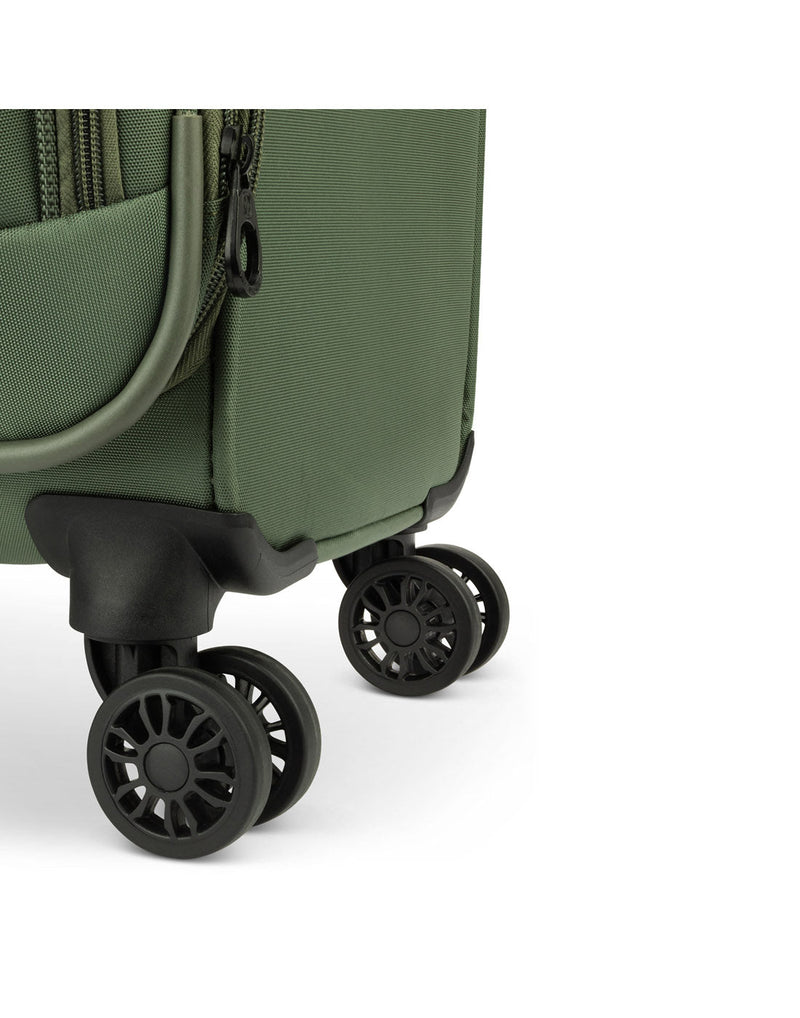 Close up of black spinner wheels on khaki Swiss Gear Altitude 24" Expandable Spinner