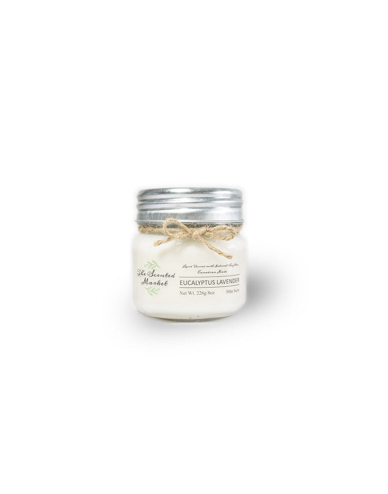 The Scented Market glass jar candle with metal lid, front view