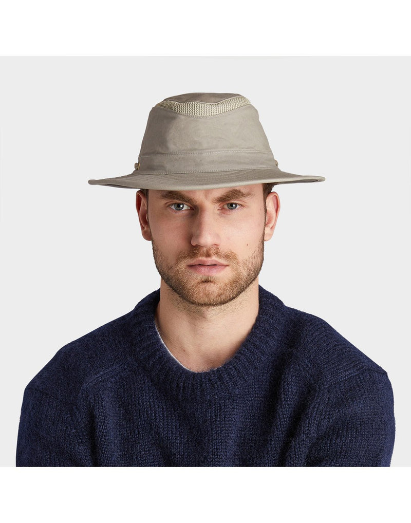 Man wearing blue sweater and the Tilley LTM6 AIRFLO® Hat in Khol, front view