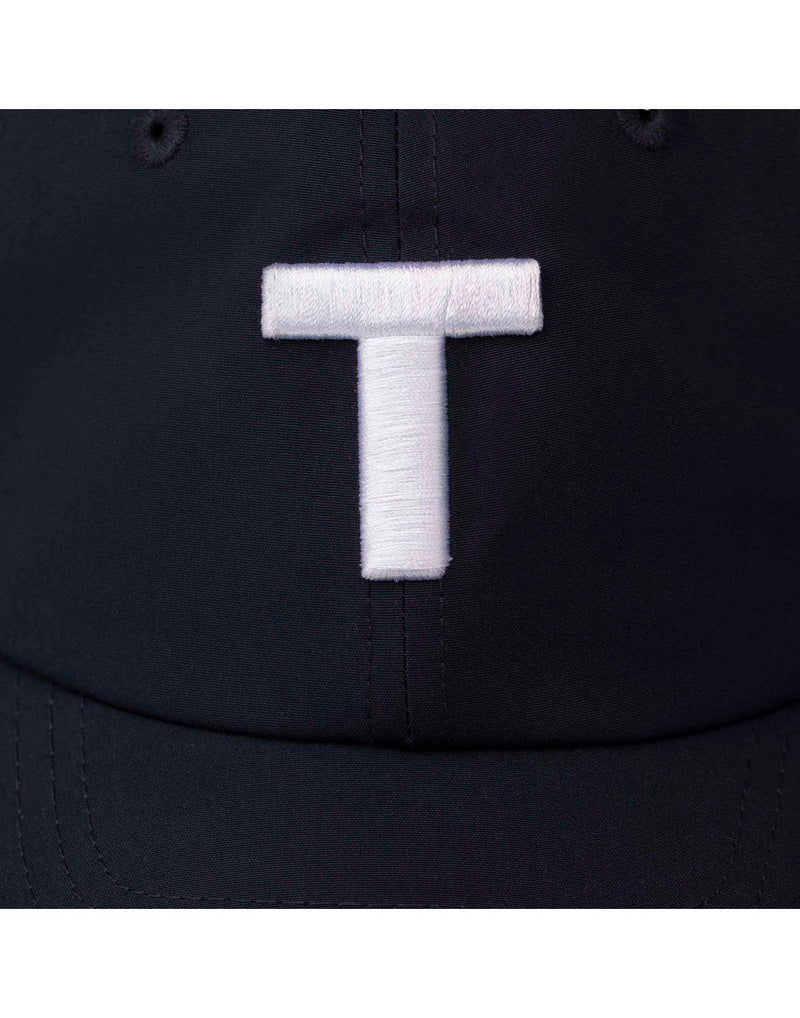 Close up of large white stitched T on dark navy Tilley T Golf Cap