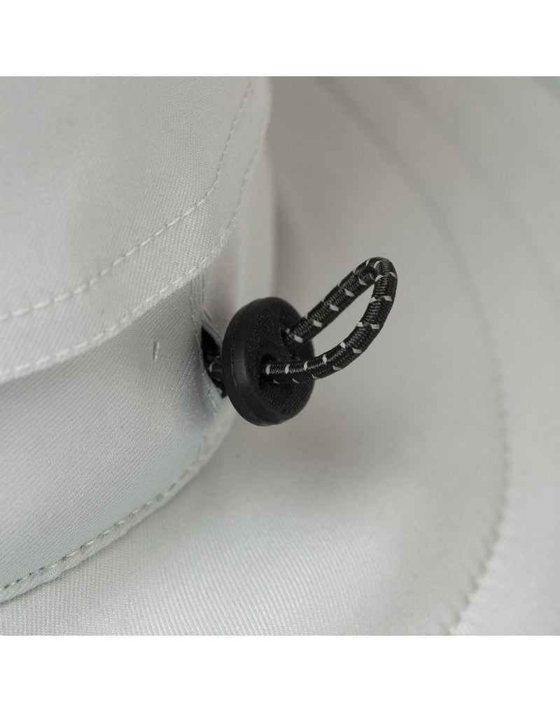 Close up of black elastic cinch on The Clubhouse Hat in light grey