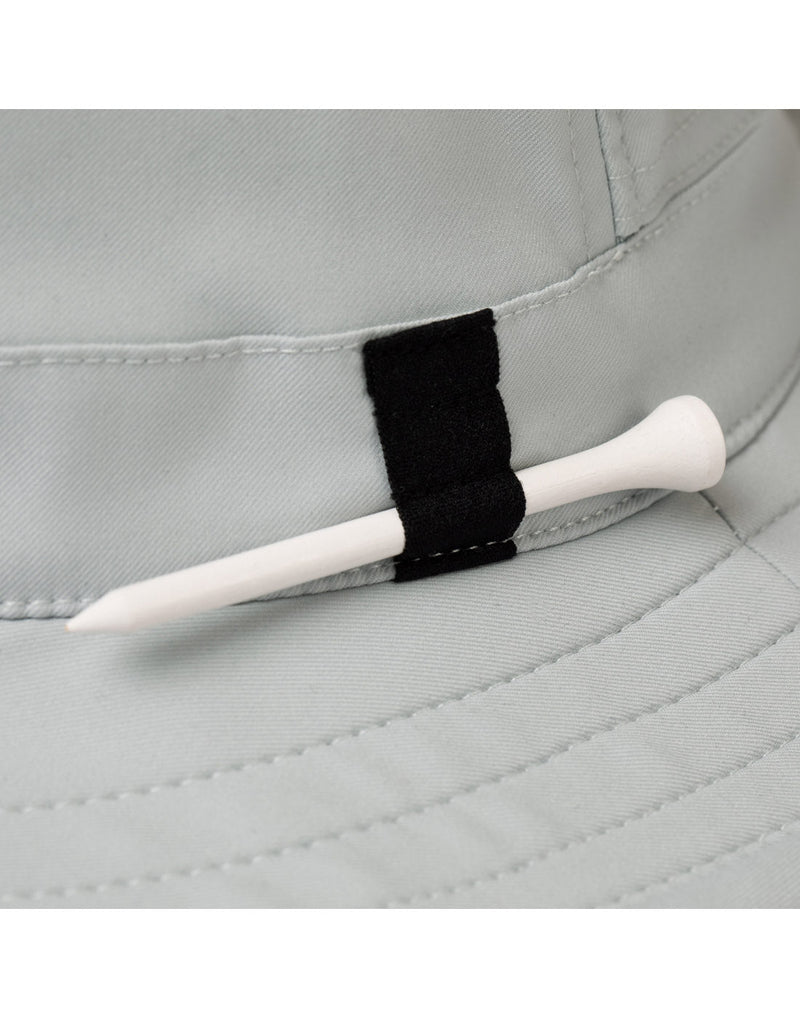 Close up of golf tee holder on base of hat crown of The Clubhouse Hat in light grey