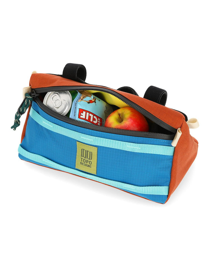 Topo Designs Bike Bag, unzipped with apple, energy bar, and pop can inside