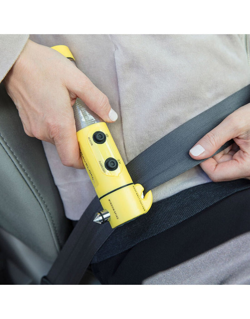 Travelon 4-in-1 Emergency Car Tool cutting a seatbelt
