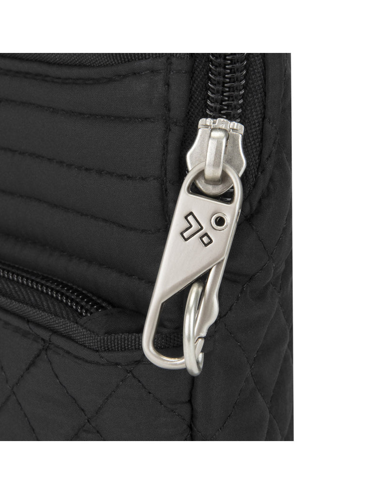 The Travelon Boho Anti-Theft Slim Crossbody in Black, close-up view of anti-theft zipper tab.