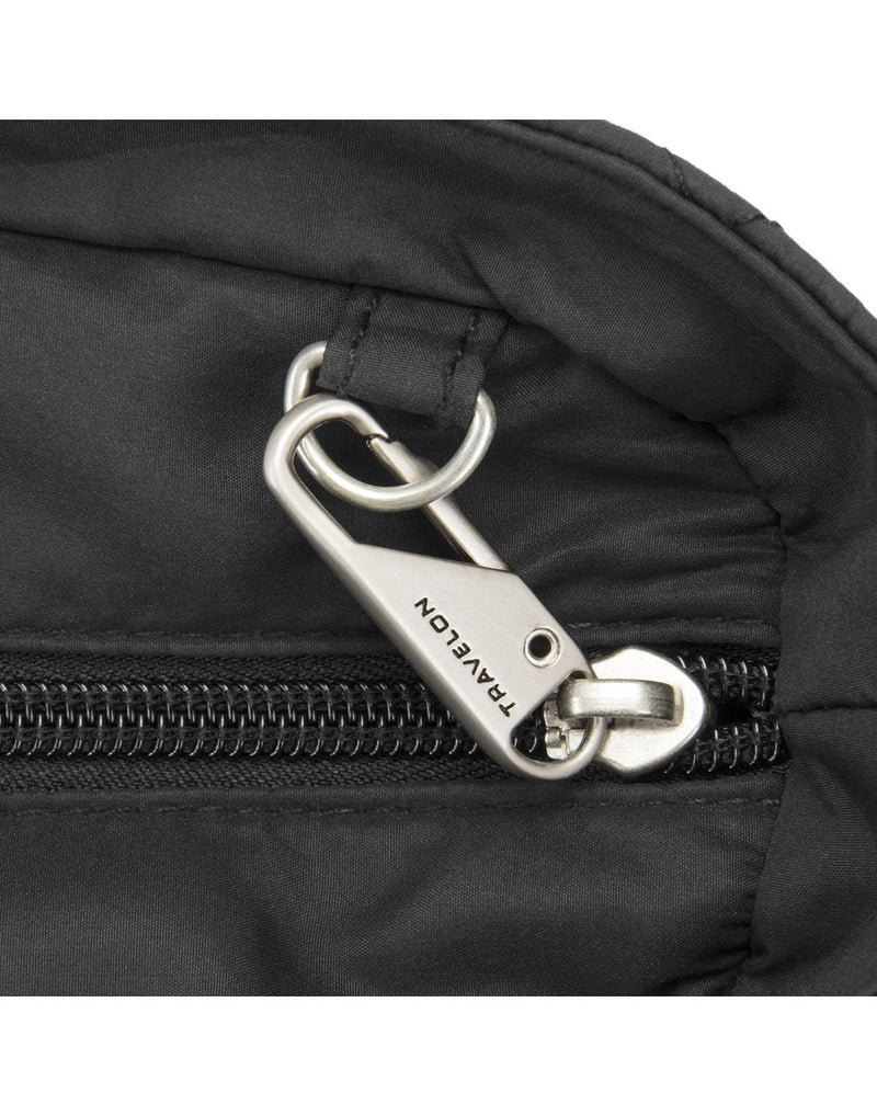 Close-up of anti-theft zipper tab on the Travelon Boho Anti-Theft Tote in Black.