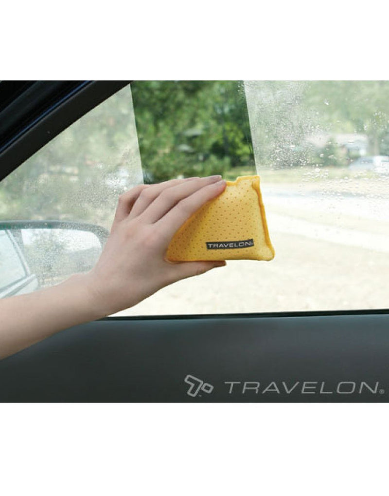 Using travelon windshield cleaner & defogger front view