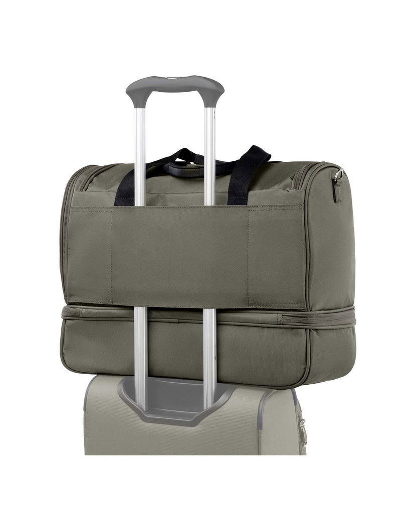 Travelpro Maxlite 5 Drop-Bottom Weekender Bag in slate green, back view of luggage loop on a suitcase handle